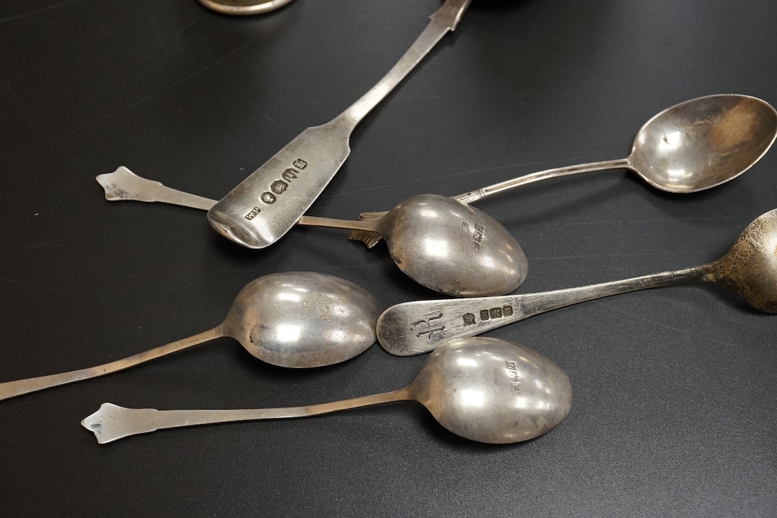 A small group of collectable silver including a pair of modern 925 and lapis lazuli set cocktail stirring spoons, an Edwardian small hexagonal tea caddy, a late Victorian pierced silver salt with blue glass liner and eig